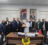 MUHTARLAR, BAŞHEKİME ÇİÇEKLE GELDİ